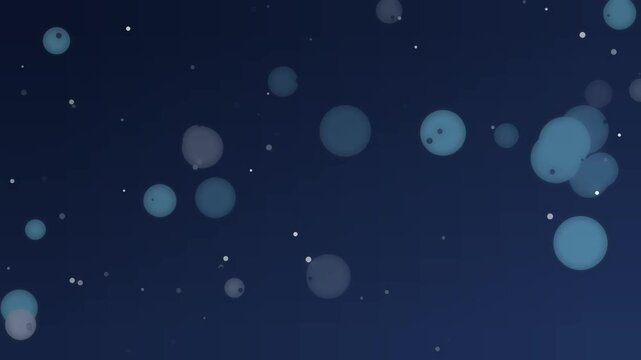 濃紺の背景に水色と銀灰の玉ボケが浮かび上がる冬のシームレスループ動画