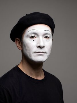 Male Mime Performer Facing Camera in Studio Portrait
