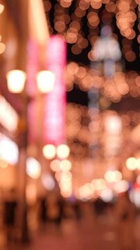 A Dreamy Evening Scene Captured in Soft Focus, Featuring Twinkling Lights and a Bustling Atmosphere, Perfect for Evoking the Magic of Nighttime Strolls