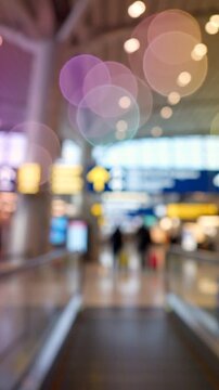 Colorful Blurred Background at Airport with Movement and Festive Lighting Highlights the Busy Atmosphere of Travelers in Transit