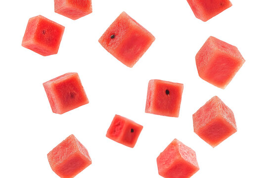 Watermelon cubes with vibrant red flesh isolated on transparent background for food design.