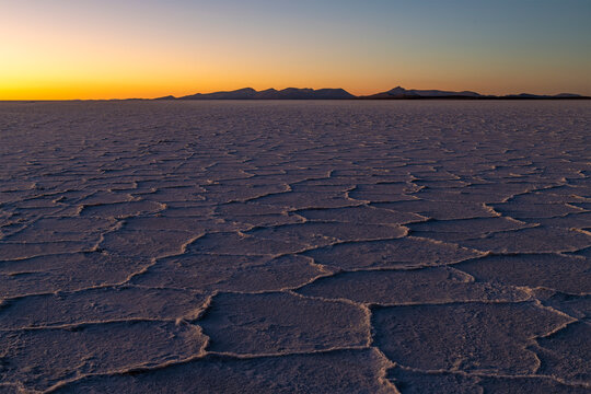 Salar de Uyuni salt flat at sunset, Bolivia.