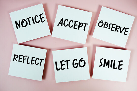 Notice, Accept, Observe, Reflect, Let Go, Smile message written on paper notes Mindfulness concept