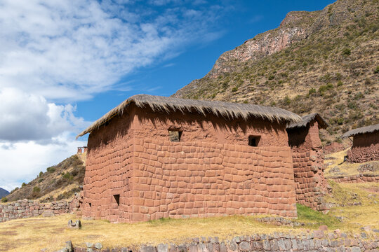 Traditional Andean Stone and Adobe Building with Thatched Roof in Peru