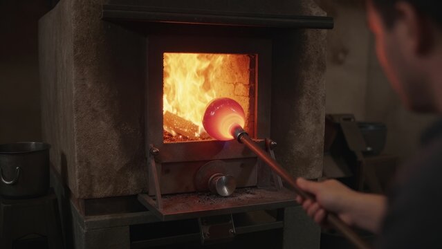 Glassblowing Process with Fiery Furnace and Hot Glass Sphere Creation