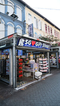 Singapore on 16 April 2026: a Gift Shop souvenir store in Chinatown, featuring a prominent Merlion logo and tax refund sign. the shop displays a variety of Singapore themed souvenirs, gifts