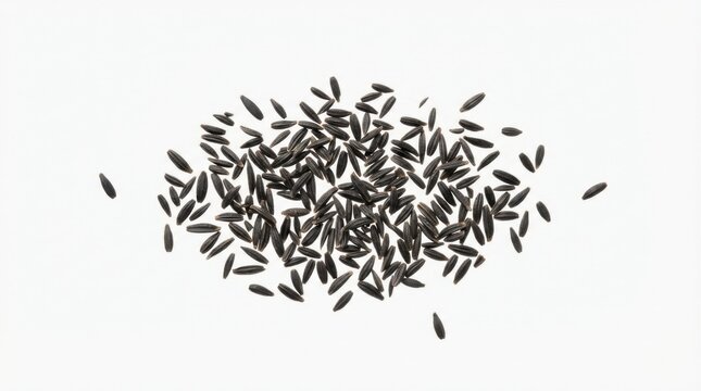 Niger seeds scattered on white background
