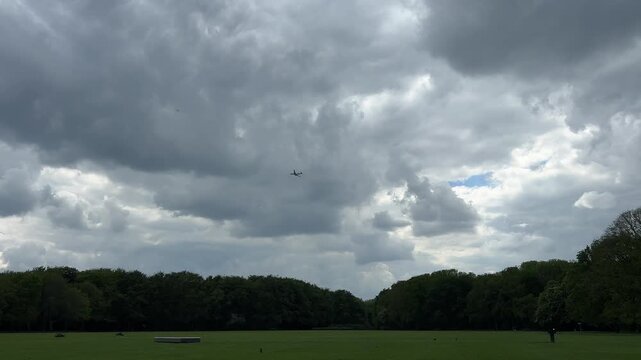 Aircraft flying over Amsterdam Forest park near Schiphol Airport, Netherlands Aircraft flying over Amsterdam Forest