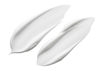 Obraz premium Two white cosmetic cream smears isolated on a transparent background