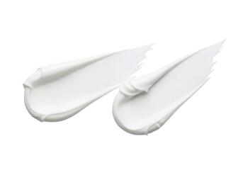 Obraz premium Two white cosmetic cream smears isolated on a transparent background