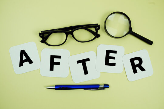 AFTER alphabet letters with magnifying glass, eye glasses and pen on yellow background