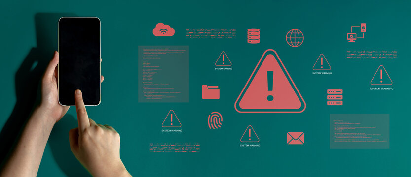 A person holds a smartphone displaying alert icons against a green background, symbolizing cybersecurity threats and the importance of digital safety in modern technology. Cyphers