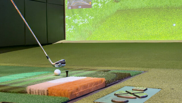 Golf Club Approaching Ball on Indoor Virtual Simulator Mat
