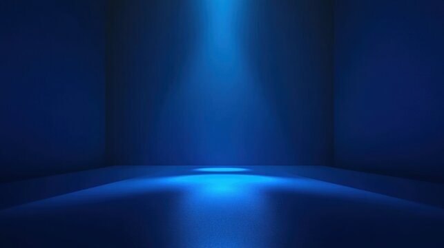 Empty dark blue studio room with a central spotlight