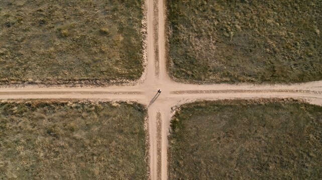 Aerial View of Person at Crossroads, Life Choice Concept