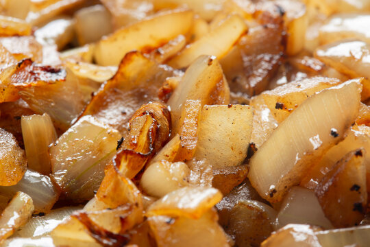 Fried chopped white onions background backdrop. Fried vegetable food concept.