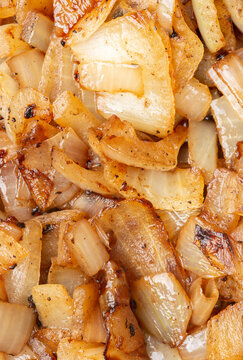 Fried chopped white onions background backdrop. Fried vegetable food concept.