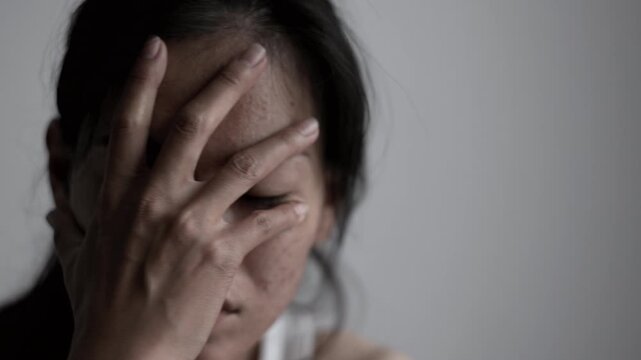 Crying woman experiencing depression and emotional pain, symbolizing family conflict, personal problems, stress, trauma, abuse, loneliness, and the need for support.