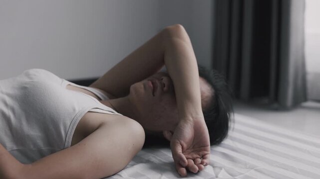 
Sad woman suffering from depression, crying with tears and emotional distress caused by family problems, relationship conflict, stress, abuse, and difficult life situations.