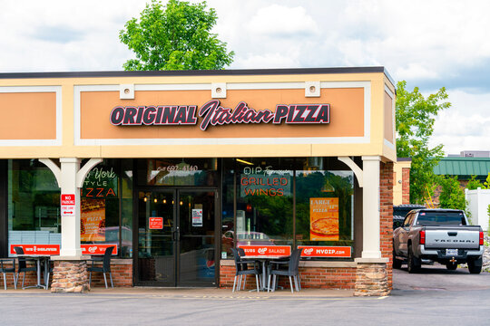 Manlius, NY - Aug 1, 2026: Exterior view of Original Italian Pizza restaurant, an American pizzeria and Italian‑American restaurant offering New York&ndash;style pizza, subs, salads, wings, and pasta dishes