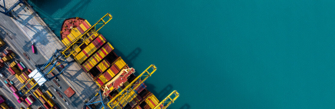 Aerial view Container cargo ship loading unloading container import export sea port, Global trade business container cargo ship freight shipping commercial trade logistic transportation international.