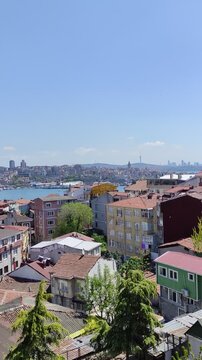 ISTANBUL, TURKEY - 06 MAY 2026: A stroll through the old streets of Istanbul with a view of the Bosphorus. Beautiful narrow streets with a rich cultural heritage.