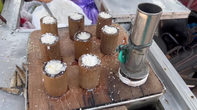 Traditional Indonesian Putu Cake Steaming Process with Human Hand