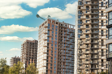 Fototapeta premium Modern Residential Development with High Rise Buildings Under Construction