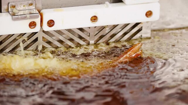 Japanese Shrimp Tempura Frying in Bubbling Hot Oil