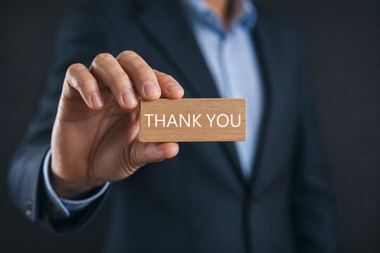 Show a text thank you from the laptop. Concept of thank you in business, Presentation in technology digital. Gift of grateful 