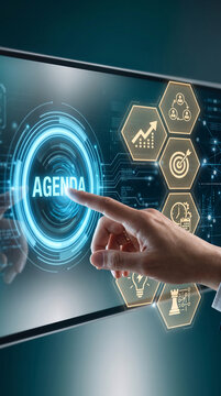 Digitally rendered screen with "AGENDA" text and business icons, showcasing digital planning and strategy, representing organization and success