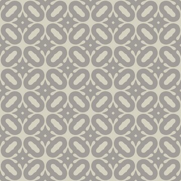 Repeating geometric pattern on gray background. Symmetrical design with curved, oval shapes. Soft tones create calm, elegant visual effect. Uniform layout suitable for various design needs
