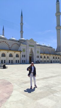 Woman stroll through the old streets of Istanbul with a view of the Bosphorus. Beautiful narrow streets with a rich cultural heritage.