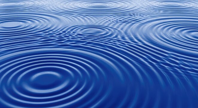 Blue water ripples spread across a dark surface. Circular wave patterns radiate outwards from several points, creating a mesmerizing visual effect.