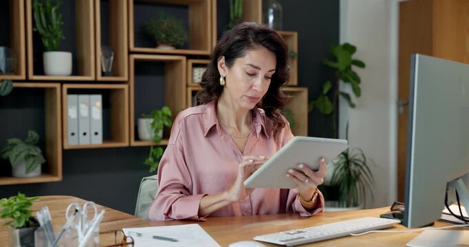 Business, woman and reading in office with tablet, research and check grammar for story update. Thinking, mature person or document in newsroom with tech, review article and comparison of manuscript
