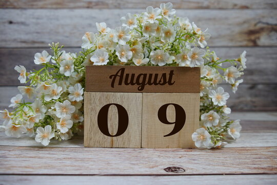 Wooden Calendar Showing the Date of August 9th. Day 9 of August month
