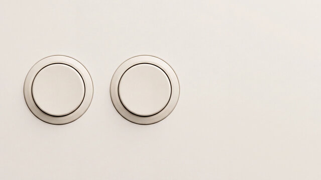 Two blank round push buttons on clean wall as accept or decline choice concept for data privacy consent user control and customer decision making