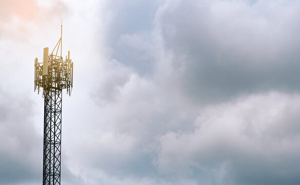 Telecommunication tower with dramatic cloudy sky. 5G mobile network, wireless communication infrastructure, digital connectivity and future technology. Telecom infrastructure, internet connectivity.