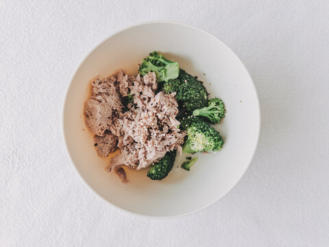 Healthy and Simple Meal with Shredded Meat and Steamed Broccoli in a White Bowl