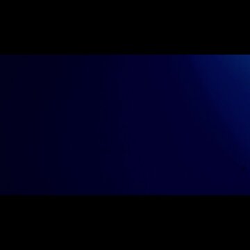 multi type of light leaks on black background with copy space. Studio lens flare bokeh effect. 4k video ubtle dust particles, and a gentle leak of light from a real lens