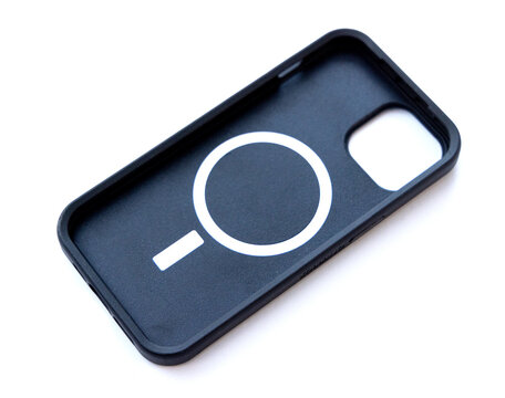 Black protective smartphone case with magnetic charging ring inside