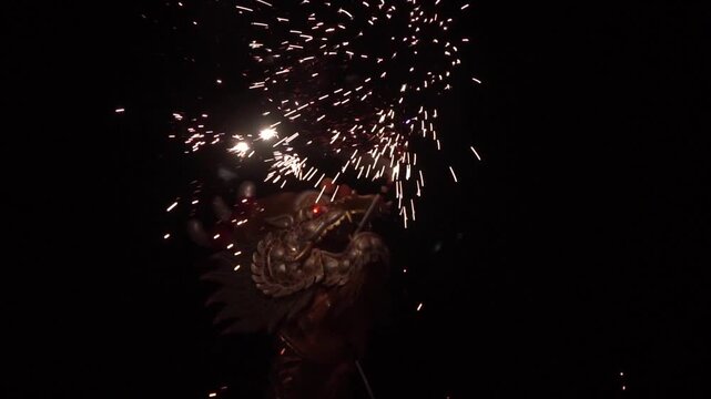 Chinese dragon performing at night.
