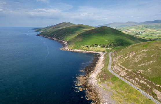 Drone aerial scenery Dingle peninsula Wild atlantic way winding coastal road along the rocky atlantic ocean coastline. Ireland, Irish landscape. Scenic route road trip. Slea head drive