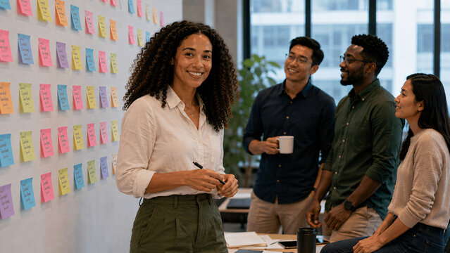 Woman leader turning with warm genuine smile