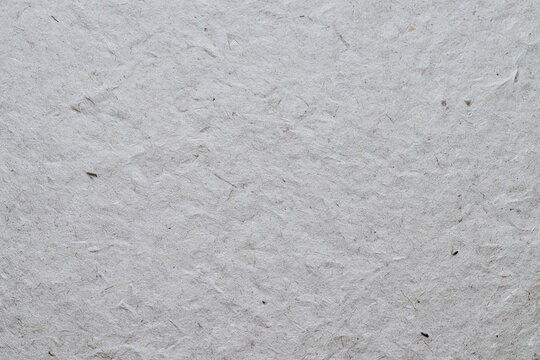 Natural recycled mulberry craft paper texture background close up