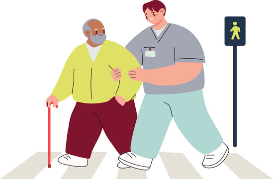 Elderly man with healthcare worker providing mobility assistance on pedestrian crosswalk. Senior male in yellow jacket with walking cane guided by professional nurse in light blue medical shirt at str