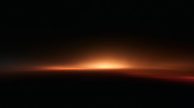 Abstract horizon line with glowing golden light and dark atmospheric gradient
