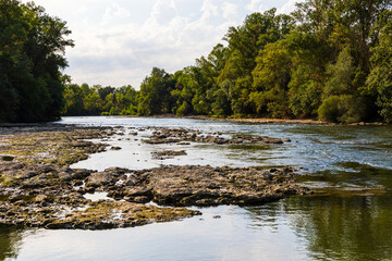Partially dried-up course of the Ariège river in summer 2026, marked by severe heat waves and...