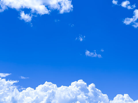Bright Blue Summer Sky with Fluffy White Clouds