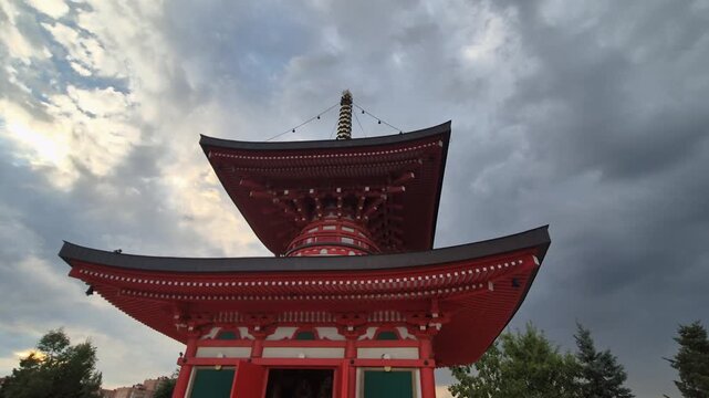 Japanese Red Pagoda Under Dramatic Cloudy sky